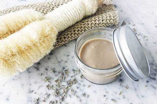 Homemade deodorant paste in small glass jar