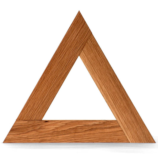 Wooden triangle trivet frame on a white background